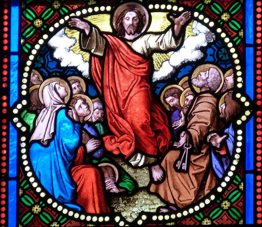 Stained glass art depicting Jesus' ascension.